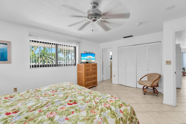 501 9th St, Key Colony, FL 33051 - bedroom featuring light tile patterned flooring, a closet, and a ceiling fan