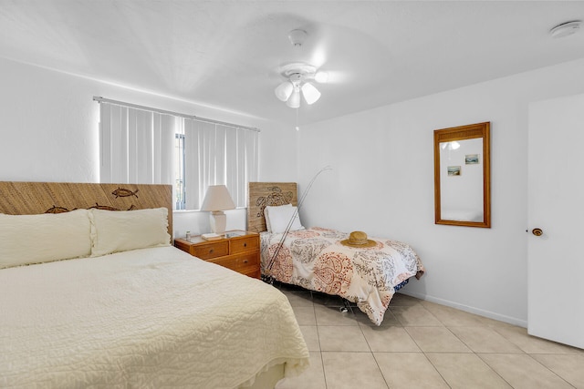 501 9th St, Key Colony, FL 33051 - bedroom featuring light tile patterned floors and baseboards