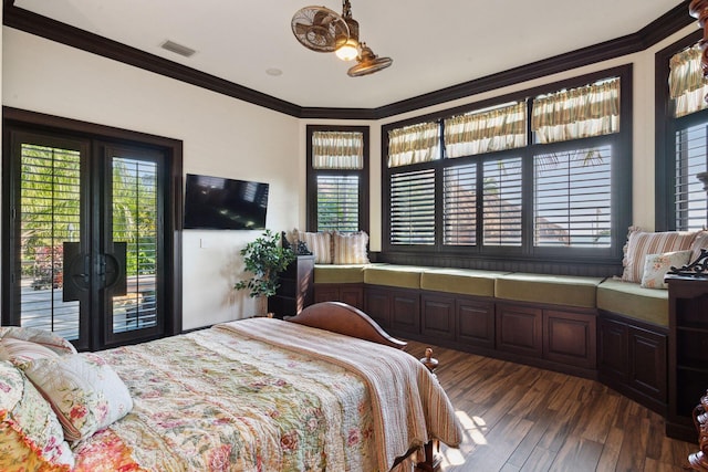 bedroom featuring ornamental molding, access to outside, visible vents, and dark wood-type flooring