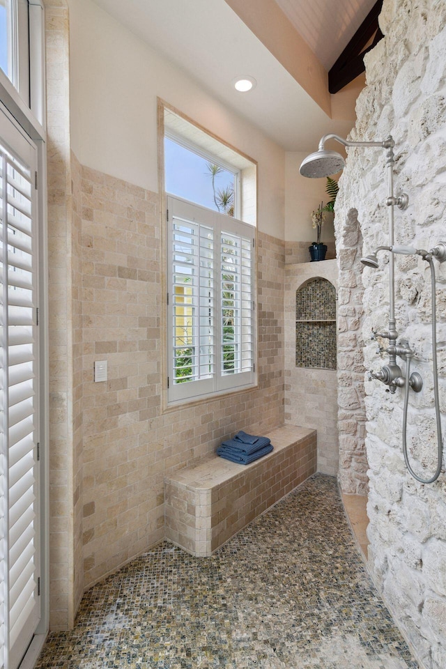 full bathroom with tile patterned flooring, beam ceiling, tiled shower, and recessed lighting