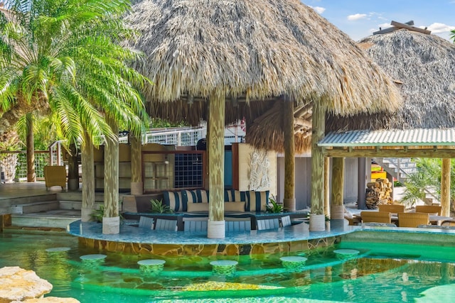 view of swimming pool with outdoor lounge area and stairway