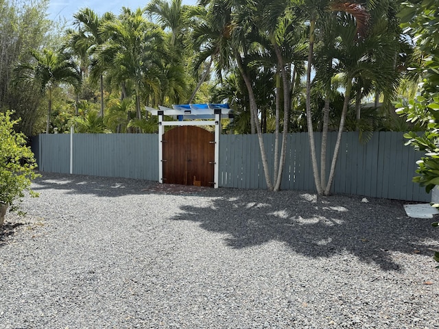 view of yard with a gate and fence