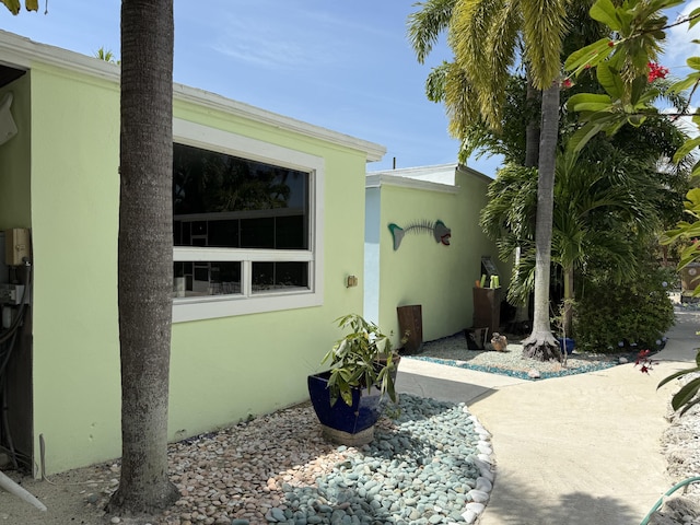 view of home's exterior with stucco siding