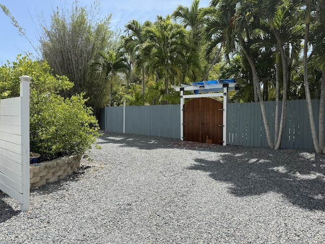 view of yard with a gate and fence