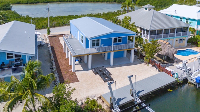 aerial view featuring a water view