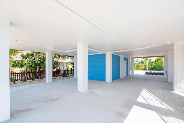 garage featuring fence