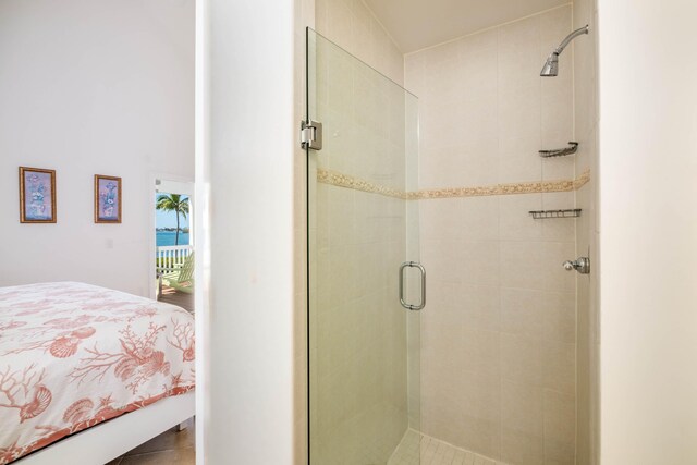 bathroom with a shower stall