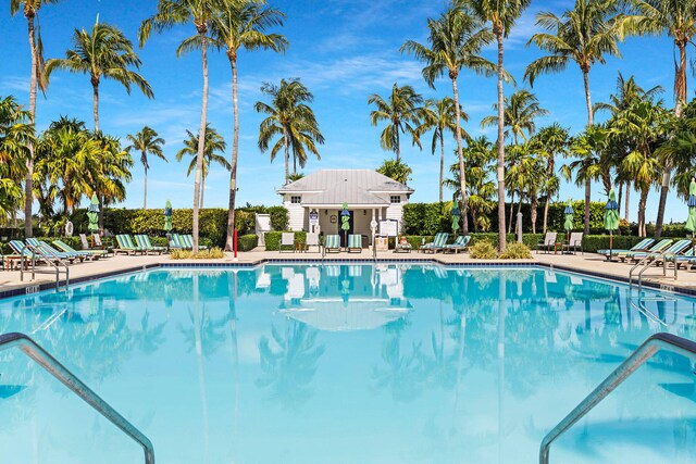 community pool featuring a patio area