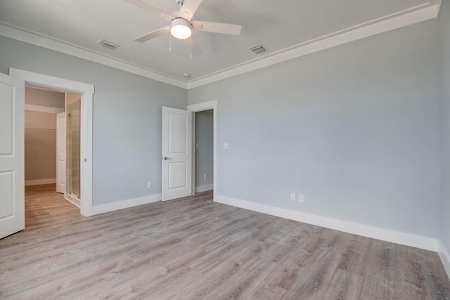 622 Diane Ave, Little Torch, FL 33042 - unfurnished bedroom featuring ornamental molding, light wood-style flooring, and ceiling fan