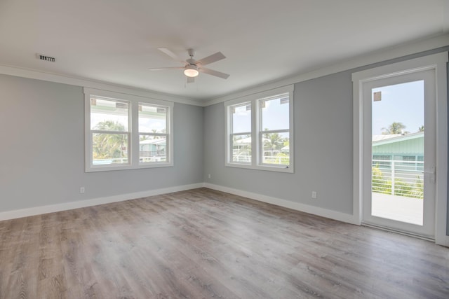 622 Diane Ave, Little Torch, FL 33042 - unfurnished room with a ceiling fan, wood finished floors, and ornamental molding