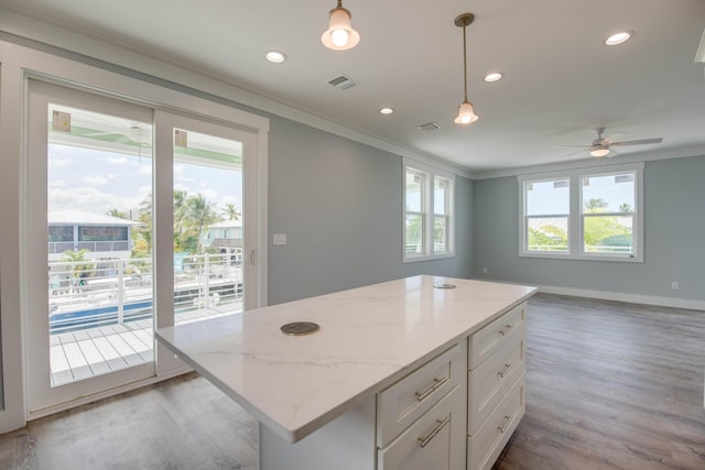 622 Diane Ave, Little Torch, FL 33042 - kitchen featuring ornamental molding, white cabinets, light wood-type flooring, ceiling fan, and hanging light fixtures