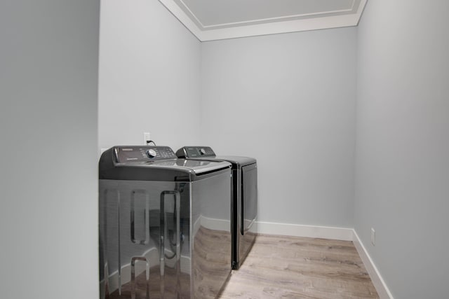 622 Diane Ave, Little Torch, FL 33042 - laundry area featuring independent washer and dryer, wood finished floors, and crown molding