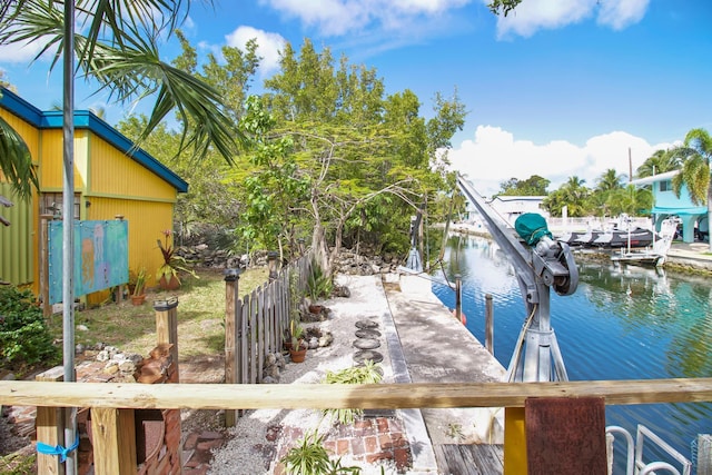 dock area with a water view