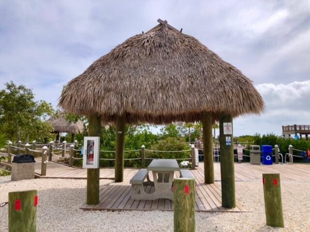 view of community with a gazebo and a wooden deck