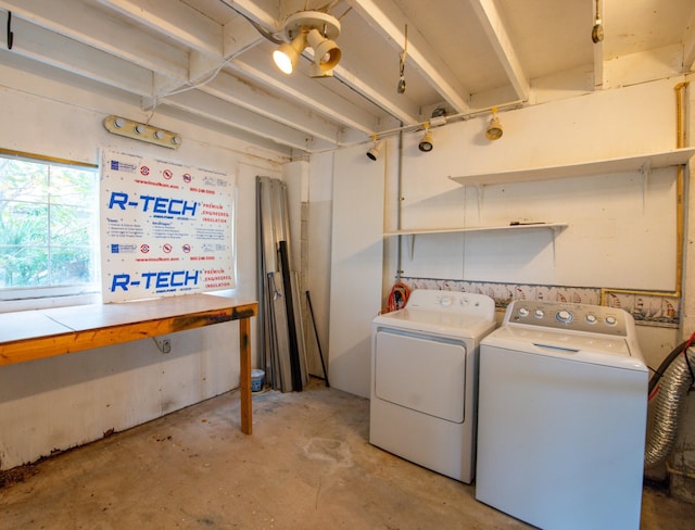 laundry room with washing machine and dryer
