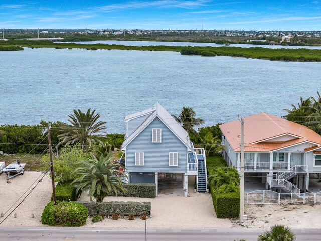 bird's eye view with a water view