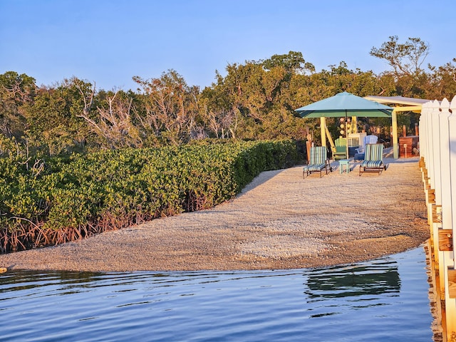 exterior space with a water view