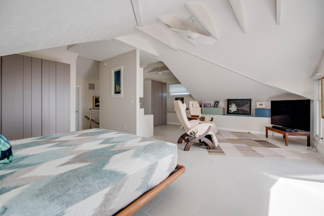 bedroom featuring vaulted ceiling