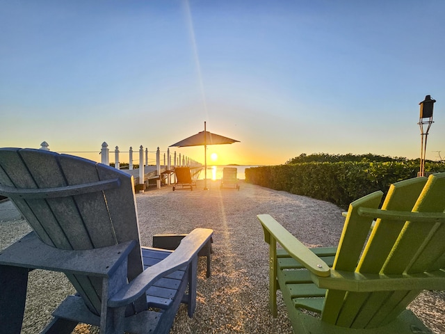 view of patio terrace at dusk