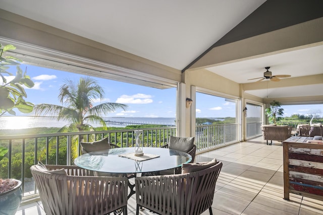 wooden deck with a ceiling fan and outdoor dining area