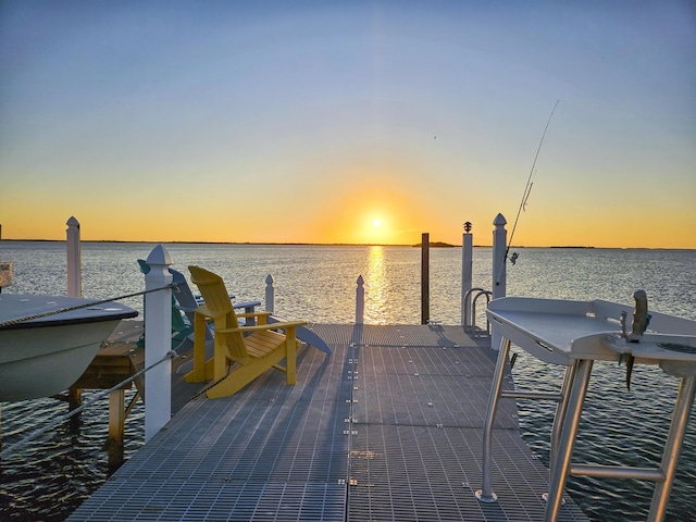 dock area featuring a water view