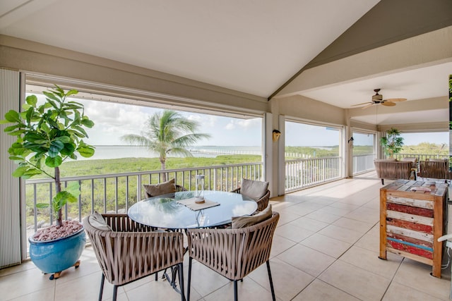 sunroom with vaulted ceiling and ceiling fan