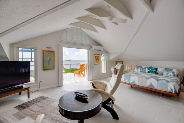 bedroom with vaulted ceiling, a water view, a wall unit AC, and access to exterior