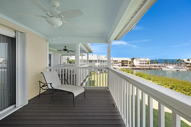 6005 Marina Villa Dr Unit C-019, Duck, FL 33050 - balcony featuring a ceiling fan, a water view, and a residential view