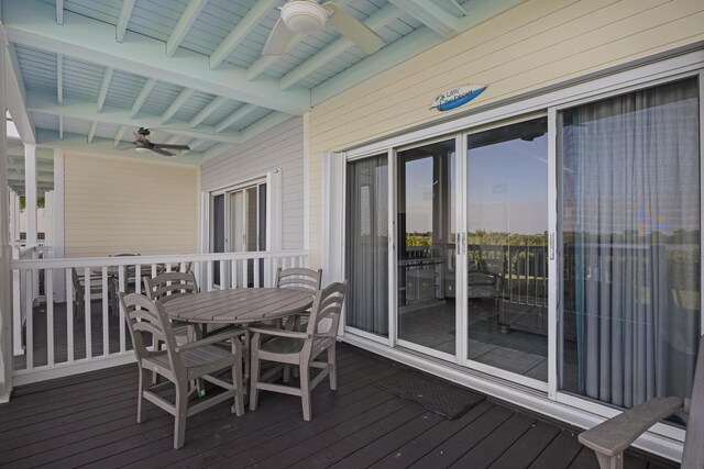 6005 Marina Villa Dr Unit C-019, Duck, FL 33050 - wooden deck featuring ceiling fan and outdoor dining space