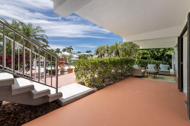 661 12th St, Key Colony, FL 33051 - view of patio / terrace featuring stairs and outdoor lounge area