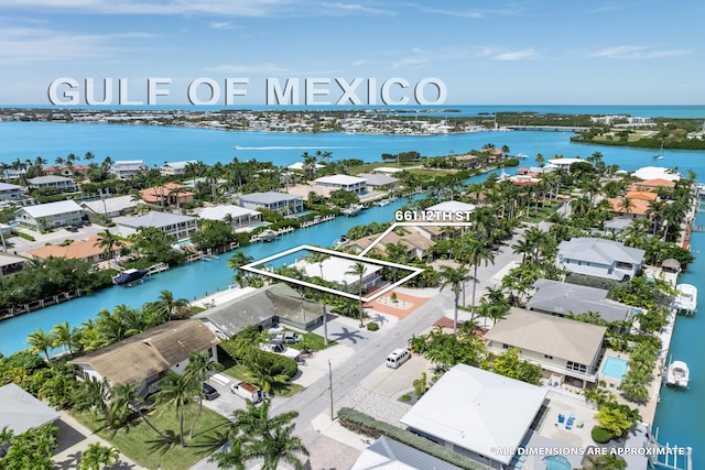 661 12th St, Key Colony, FL 33051 - aerial view of residential area with a large body of water and property boundaries highlighted