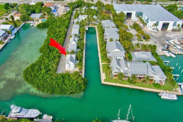 birds eye view of property featuring a residential view and a water view