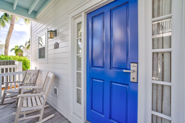 doorway to property with a porch