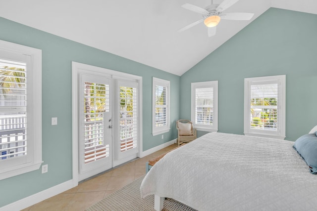 bedroom featuring light tile patterned floors, french doors, baseboards, and access to outside