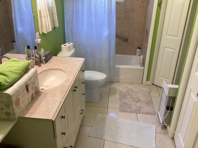 full bath featuring shower / bath combo with shower curtain, vanity, toilet, and tile patterned floors