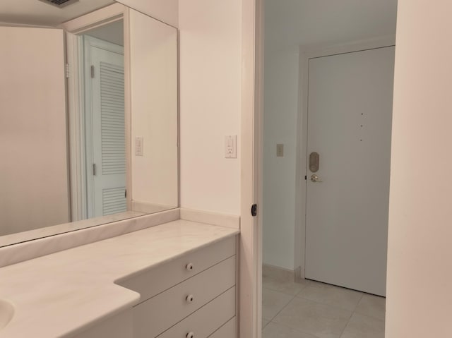 bathroom featuring tile patterned floors, visible vents, and vanity