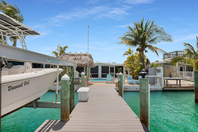 8 Sadowski Cswy, Key Colony, FL 33051 - dock featuring boat lift and a water view