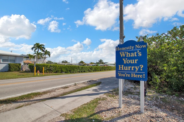 8 Sadowski Cswy, Key Colony, FL 33051 - view of asphalt road featuring sidewalks