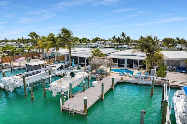 8 Sadowski Cswy, Key Colony, FL 33051 - dock area with a patio, a water view, and an outdoor pool