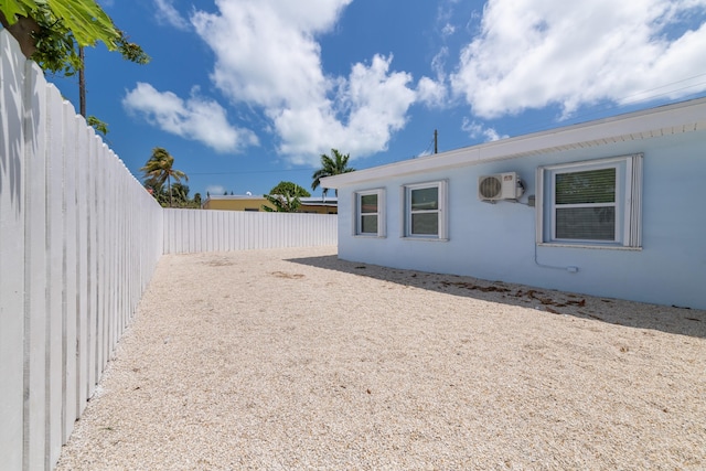 view of home's exterior with a fenced backyard and stucco siding