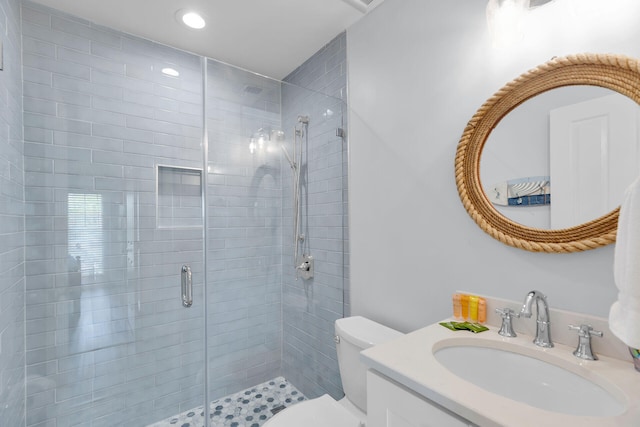 12399 Overseas Hwy Unit 12, Marathon, FL 33050 - bathroom with a stall shower, vanity, recessed lighting, and toilet