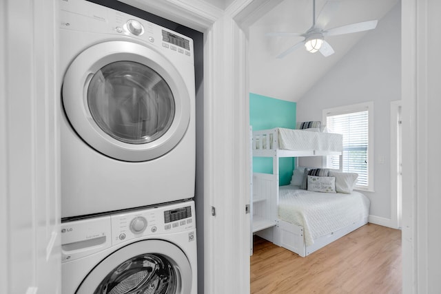 12399 Overseas Hwy Unit 12, Marathon, FL 33050 - washroom with ceiling fan, baseboards, stacked washer / drying machine, and wood finished floors