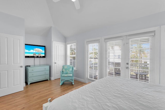 12399 Overseas Hwy Unit 12, Marathon, FL 33050 - bedroom featuring a ceiling fan, wood finished floors, baseboards, lofted ceiling, and access to exterior