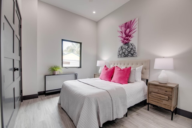 3702 Duck Ave, Key West, FL 33040 - bedroom featuring baseboards, recessed lighting, and light wood-style flooring