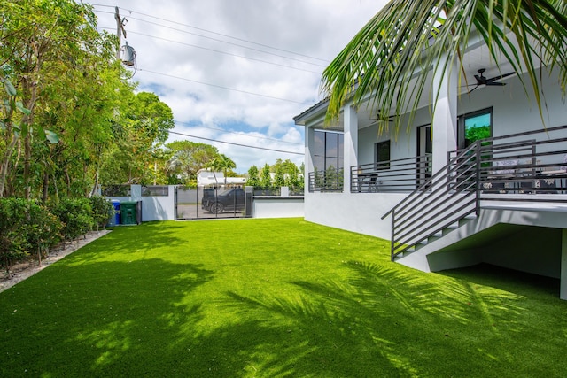 3702 Duck Ave, Key West, FL 33040 - view of yard with a ceiling fan, a gate, and fence