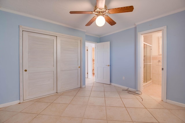 681 Indies Dr, Ramrod, FL 33042 - unfurnished bedroom with ornamental molding, a closet, tile patterned floors, a ceiling fan, and connected bathroom