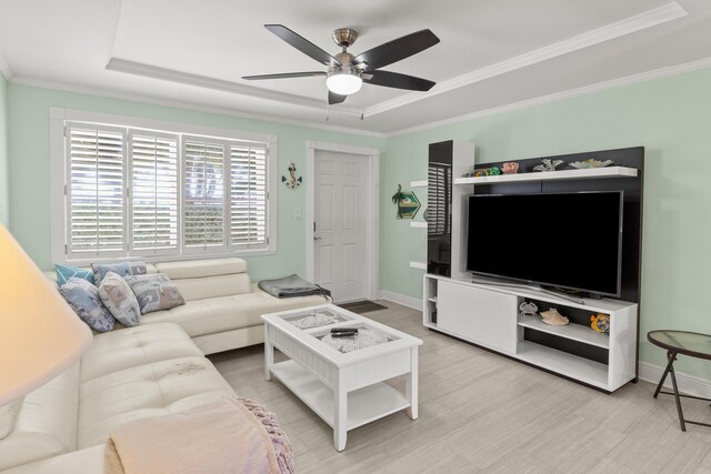 1215 97th St Unit 2, Marathon, FL 33050 - living room featuring a tray ceiling, a ceiling fan, wood finished floors, crown molding, and baseboards