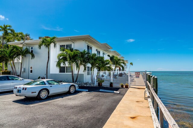 1215 97th St Unit 2, Marathon, FL 33050 - dock featuring a water view and fence