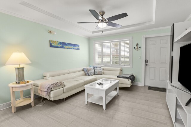 1215 97th St Unit 2, Marathon, FL 33050 - living area with a raised ceiling, a ceiling fan, crown molding, and baseboards