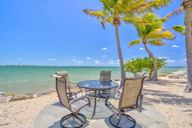 view of patio / terrace with a water view